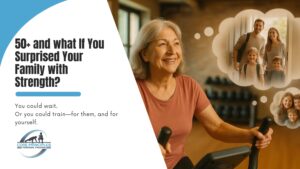 Older woman smiling on a stationary bike thinking about her family, representing strength training and active aging for adults 50+ at Core Principles in Stamford, CT.