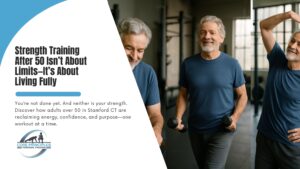 Older man lifting dumbbells at personal training gym in Stamford CT for adults over 50