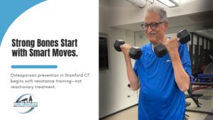 Older man lifting dumbbells during a strength training session in Stamford CT, promoting smart osteoporosis prevention for seniors.